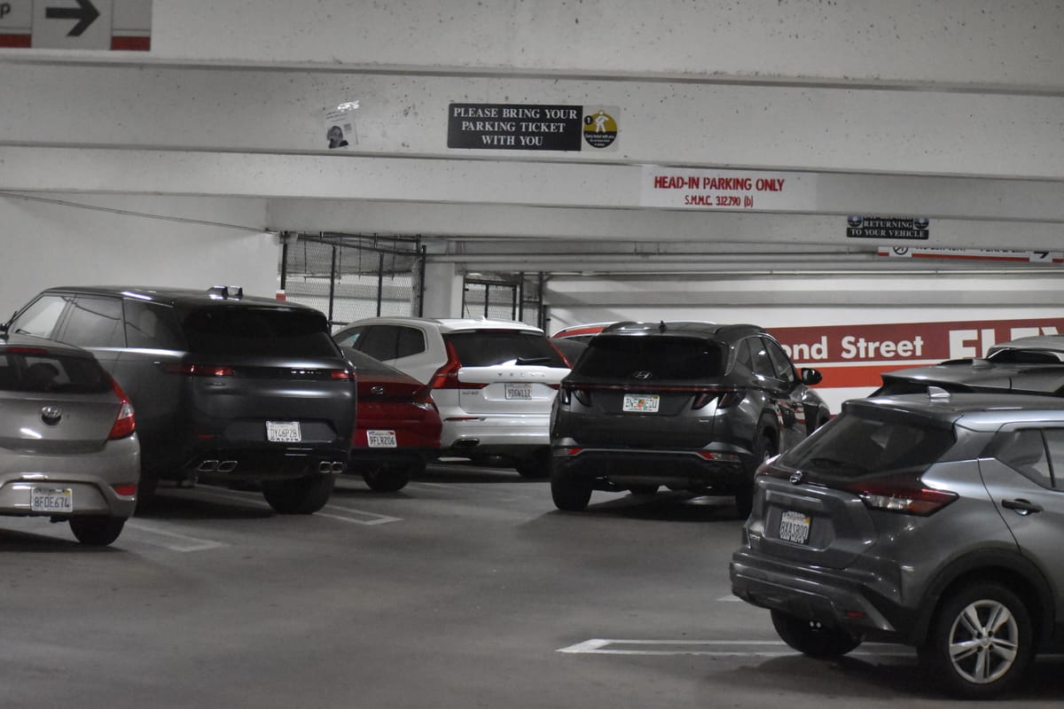 City Hall pauses parking rate increase after businesses revolt