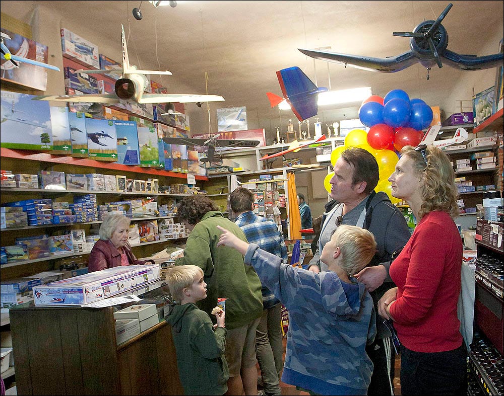 A boy points to some of the model planes in Evett's Model Shop on Saturday. (Photo by Brandon Wise)