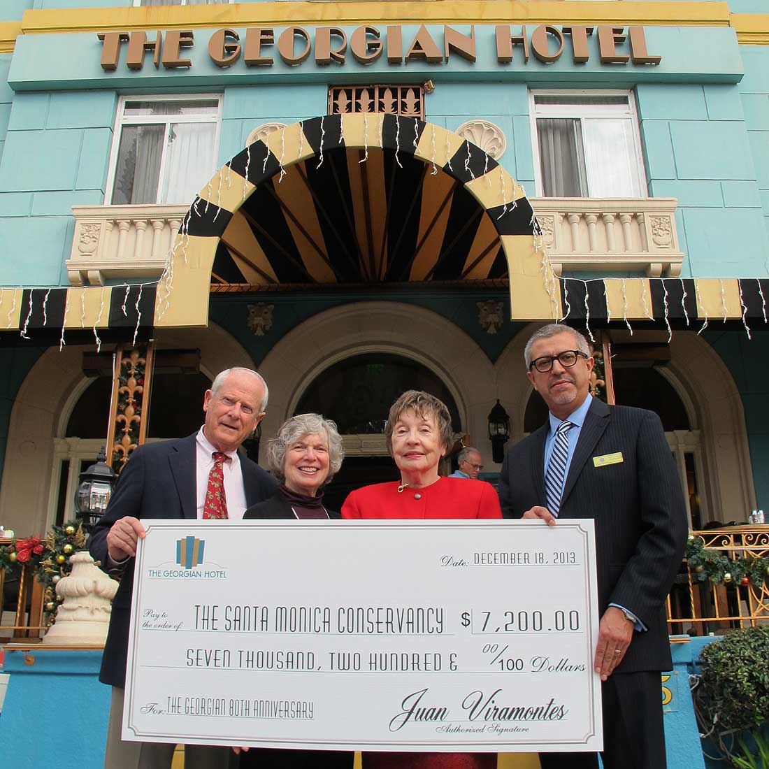 (L-R) Georgian Hotel owner, Ted Broedlow; Carol Lemlein, Santa Monica Conservancy president; Kay Pattison, leader of the Santa Monica Conservancy's Downtown Walking Tours; Georgian Hotel General Manager Juan Viramontes.