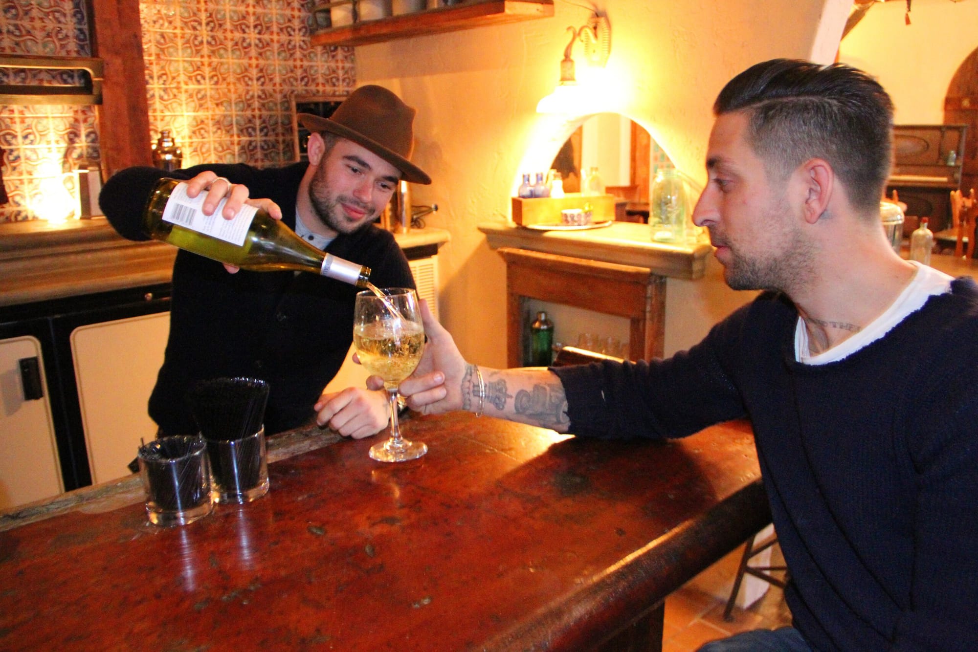 Designer Matt Winter (right) and owner Max Russo share a drink during the days leading up to the opening of 41 Ocean. (Daniel Archuleta daniela@www.smdp.com)