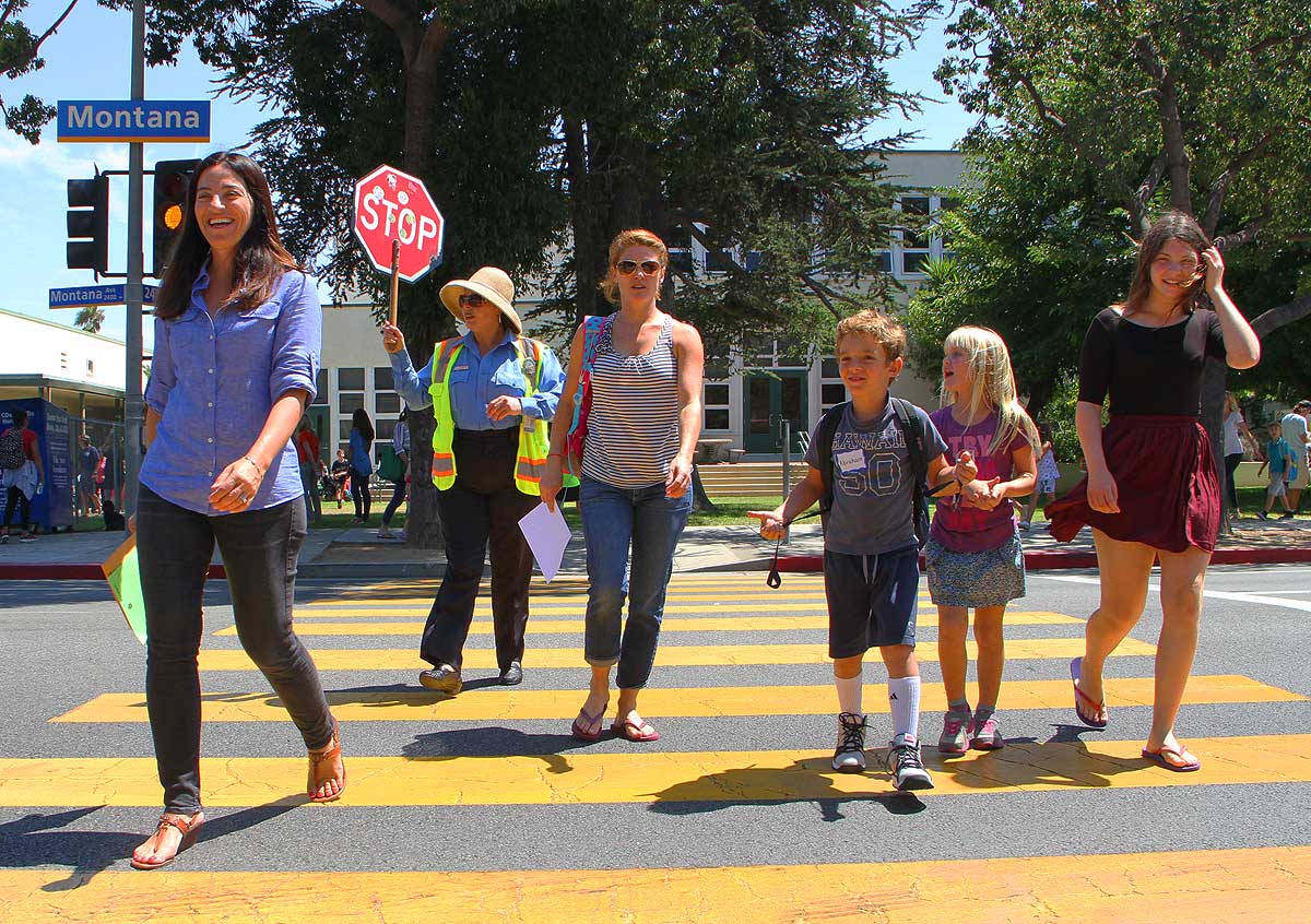 SAFETY: Crossing guards are among the city employees who may be in line for raises. (Daniel Archuleta daniela@www.smdp.com)