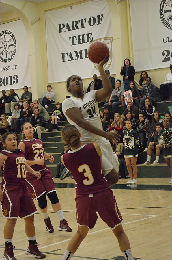 UPS: St. Monica's Briana Harris goes up for a layup against Cantwell-Sacred Heart on Tuesday. (Photo by Alex Vejar)