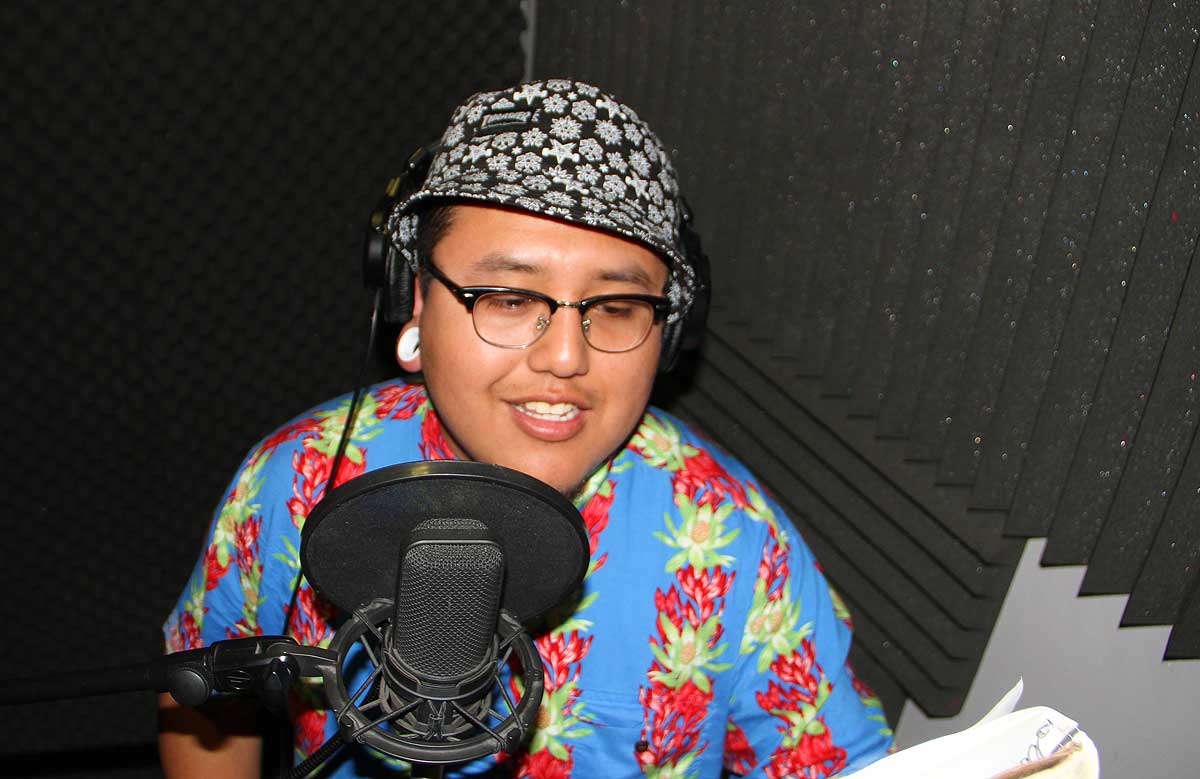 LAYING DOWN VOCALS: Eddie Martinez puts in work at Pico Youth & Family Center's recording studio. (David Mark Simpson dave@www.smdp.com)