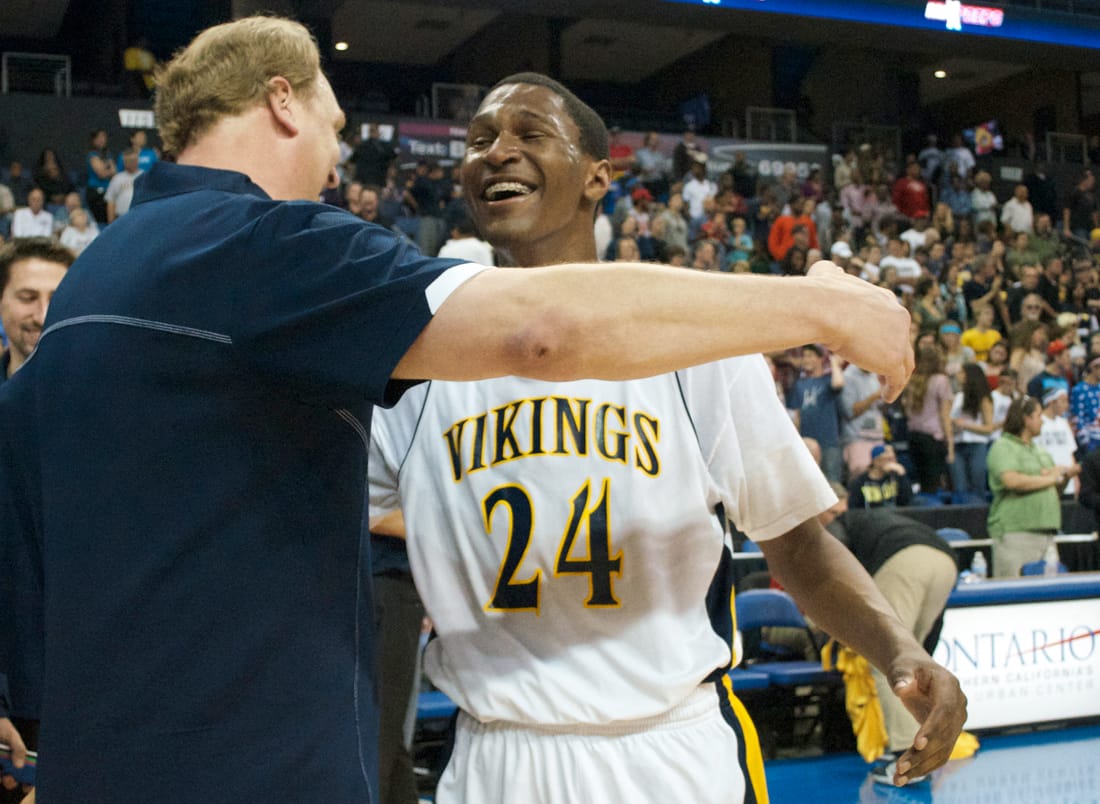 Samohi head coach James Hecht (left) and guard Jordan Mathews celebrate after winning the CIF State Regional final against Loyola on March 16. (Photo by Paul Alvarez Jr.)