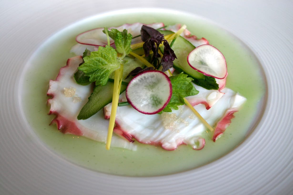 Octopus sashimi Kyoto style. The plate was presented like a picture, with green sauce framing the slices of octopus and radish. The taste  of the herb vinaigrette includes a mild citrus flavor perfectly complementing the mild flavor of the octopus. (Kevin Herrera kevinh@www.smdp.com)