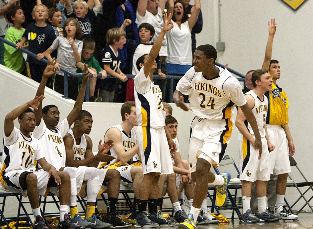 CHEERING SECTION: Santa Monica's Jordan Mathews reacts after hitting a three pointer in overtime to help defeat Palisades High School 76-63 in the quarterfinals of the Division 1 State Championships in March. Samohi would go on to represent Southern California in the state final. (Photo by Michael Yanow)