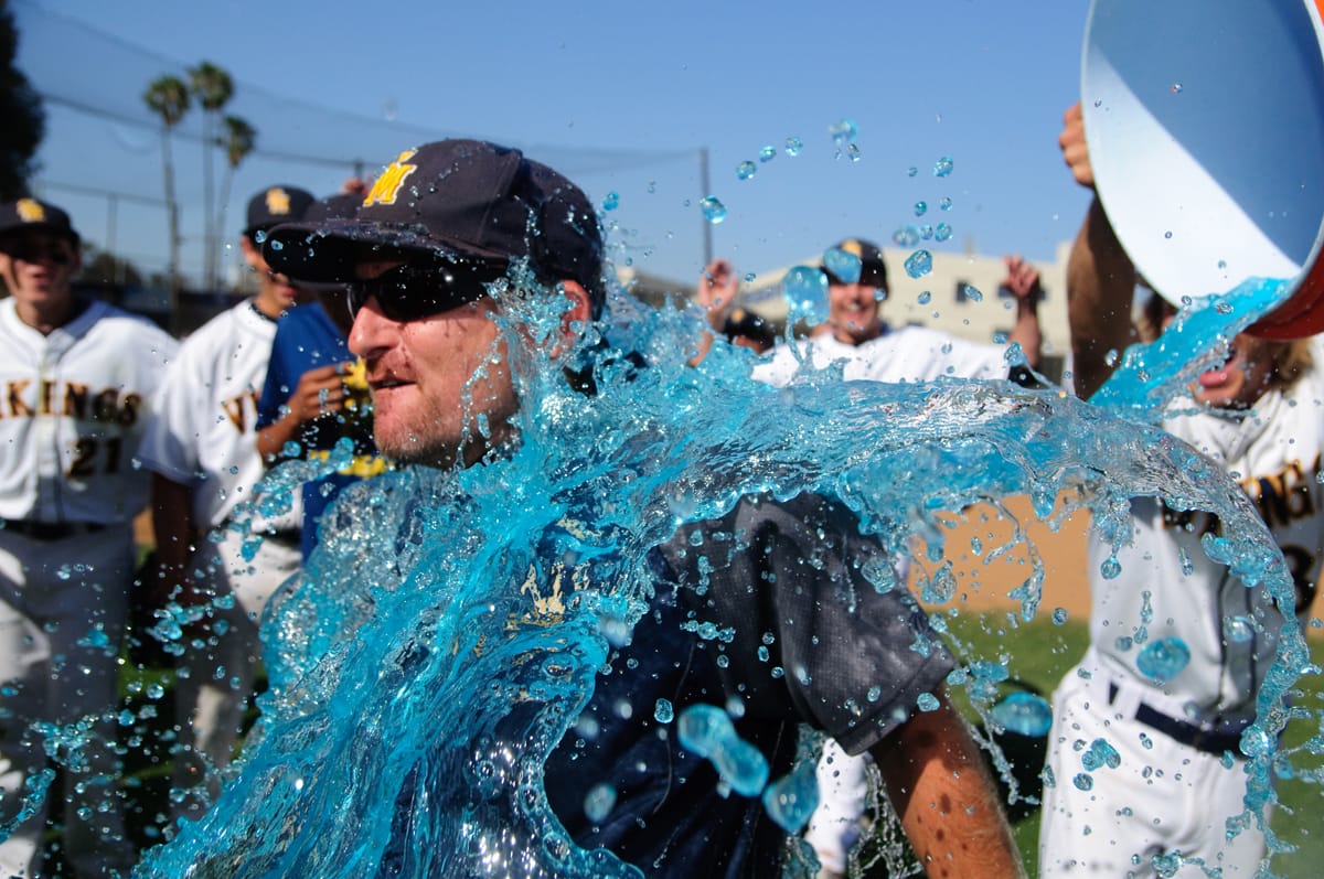 BATH TIME: Samohi head coach Kurt Schwengel was given a Gatorade bath after beating Culver City on Tuesday. (Morgan Genser editor@www.smdp.com)