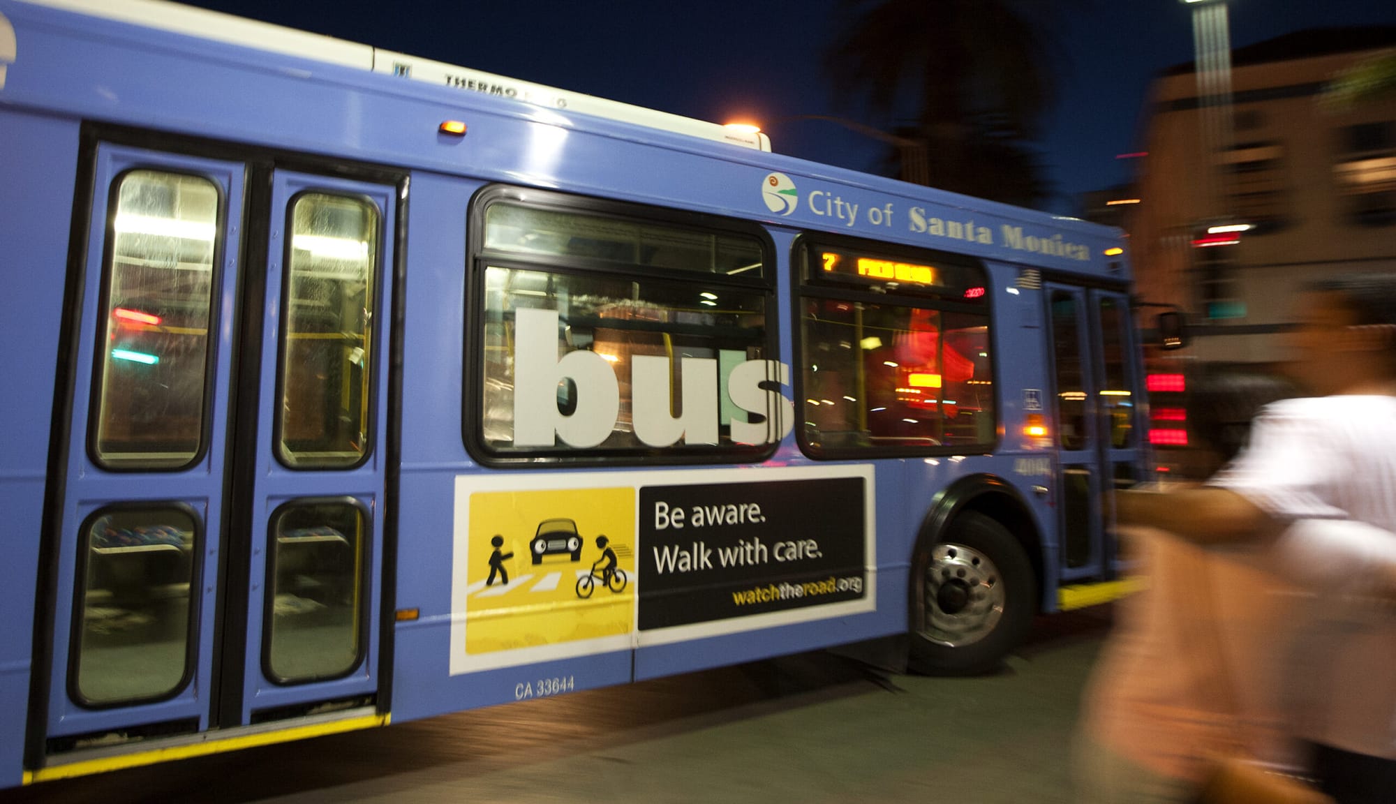 A Big Blue Bus makes a right turn onto Santa Monica Boulevard last month. The director of the bus company said big changes are needed. (Photo by Michael Yanow)
