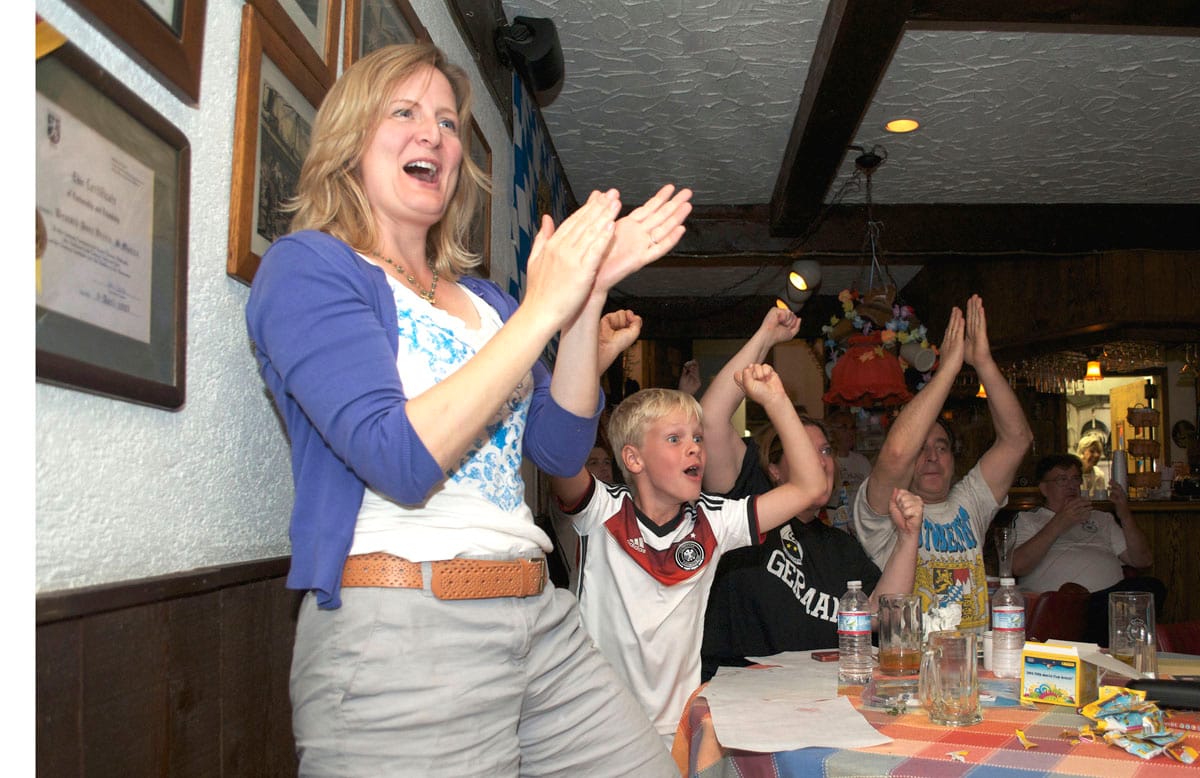 Families and friends cheer after Germany scored their fourth goal against Portugal Monday morning in the World Cup. (Paul Alvarez)