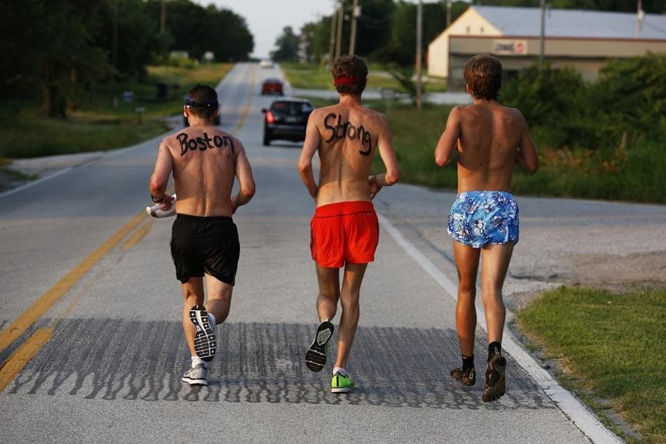 Participants in last year's run for Boston Marathon bombing victims sport the city's motto following the attack — "Boston Strong." (Photo courtesy