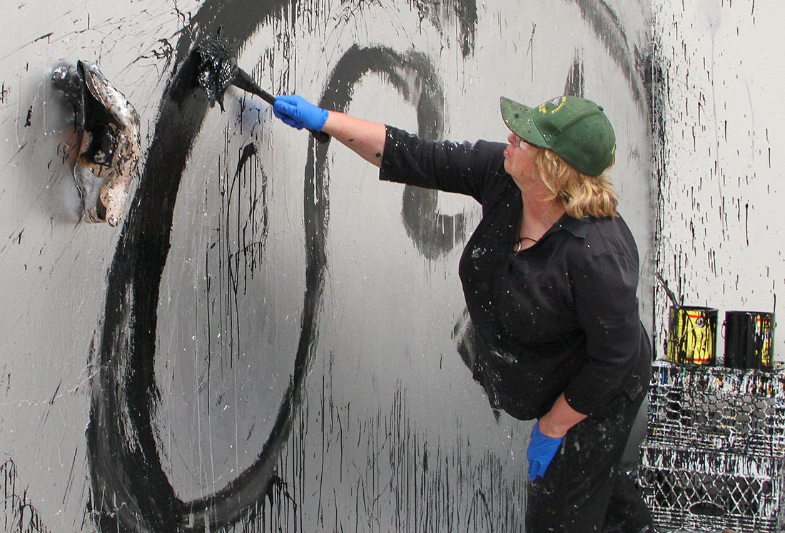 Artist Joyce Pensato works on a site-specific piece on for her recent show 'I Killed Kenny' at the Santa Monica Museum of Art, which is located at the Bergamot Station Arts Center. (Photo by Daniel Archuleta)