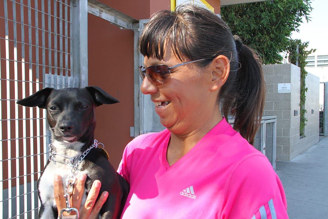 Maria Lieske says that her dog Boots is quite popular at the OPCC homeless service center. (Daniel Archuleta daniela@www.smdp.com)