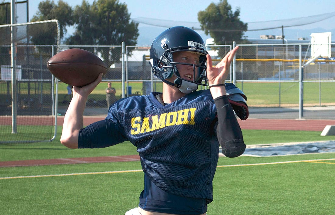 THROWING DARTS: Jordan Detamore throws during quarterback workouts on Tuesday afternoon at Santa Monica High School. (Paul Alvarez Jr. editor@www.smdp.com)