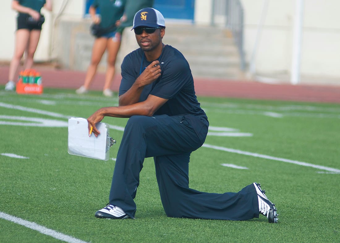 EYES OUT: Samohi head coach Travis Clark watches a scrimmage last week. (Paul Alvarez Jr. editor@www.smdp.com)