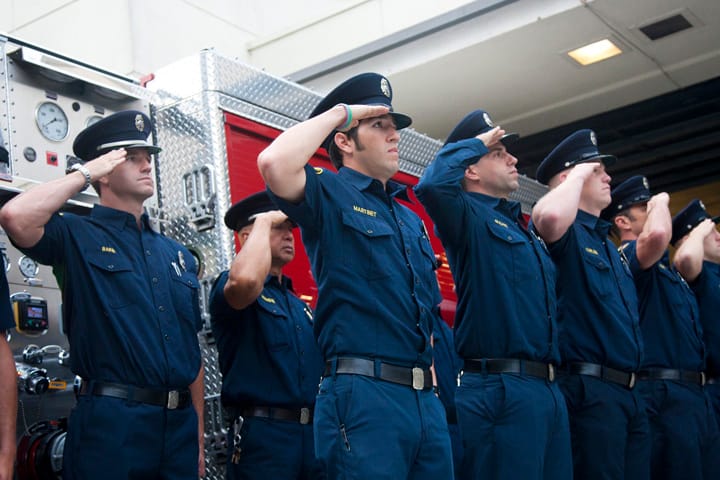 Fire Fighters gather at Fire Station 1 on Wednesday morning to remember those who lost their lives in the terrorist attacks of Sept. 11, 2001, including the public safety personnel who died while trying to rescue those trapped in the World Trade Center towers. (Brandon Wise brandonw@www.smdp.com)
