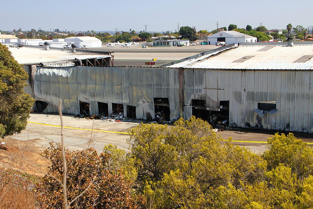 Tape marks off the hangar where a small jet crashed at Santa Monica Aiport on Sunday evening. (Daniel Archuleta daniela@www.smdp.com)