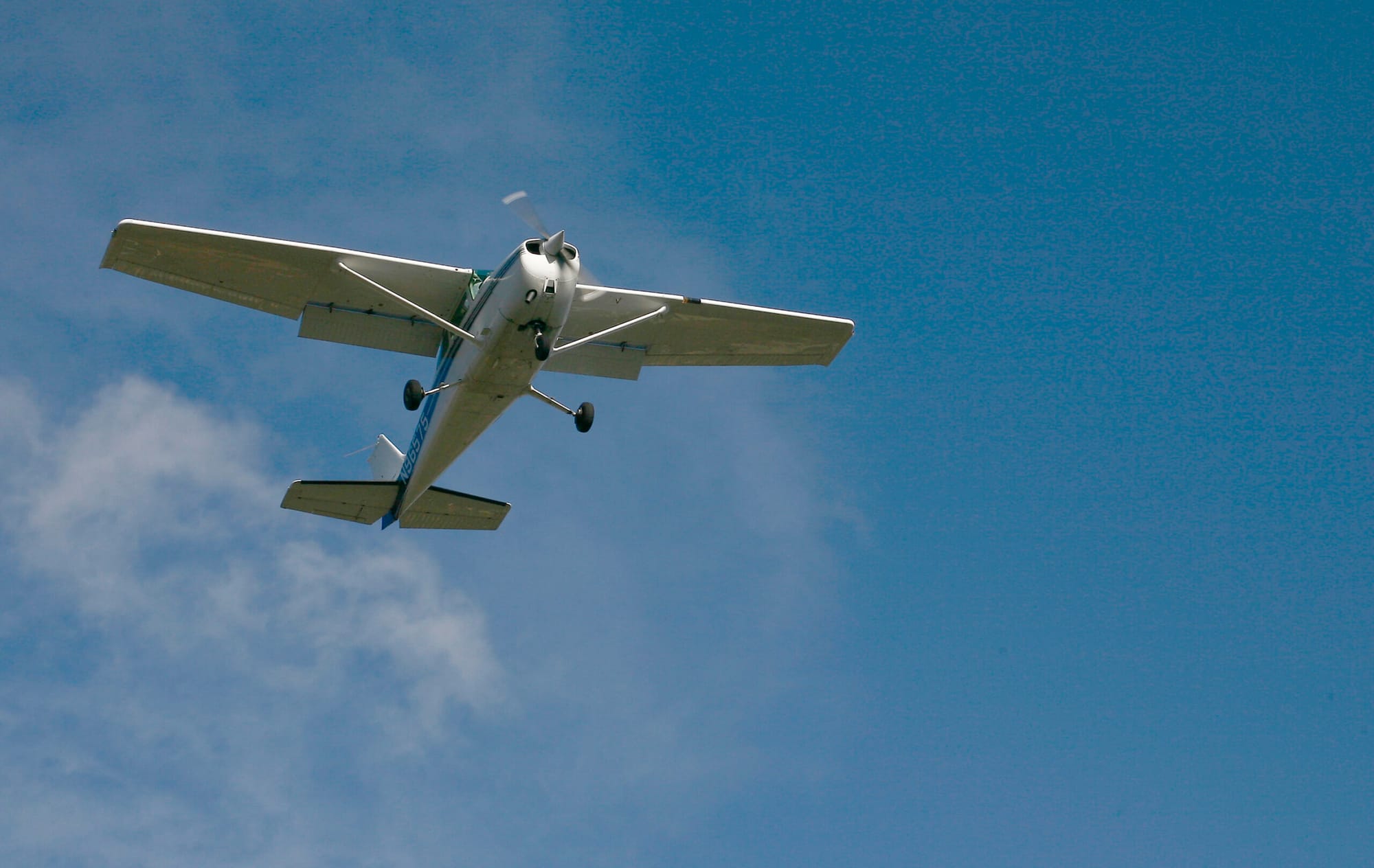 A plane fly's over a neighborhood off of Bundy Drive. (File photo)