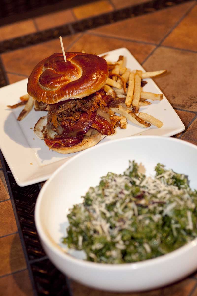 Rick's Tavern on Main features bar staples like their pulled-pork burger with bacon for the hearty eaters and a kale salad with parmesan for those looking for something lighter. (Brandon Wise brandonw@www.smdp.com)