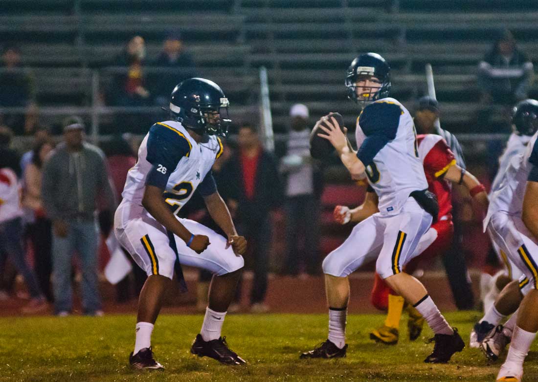 Samohi quarterback Jordan Detamore passes the ball against Hawthorne High School Friday night. Detamore threw three touchdown passes during the 42-0 win. (Paul Alvarez Jr. editor@www.smdp.com)