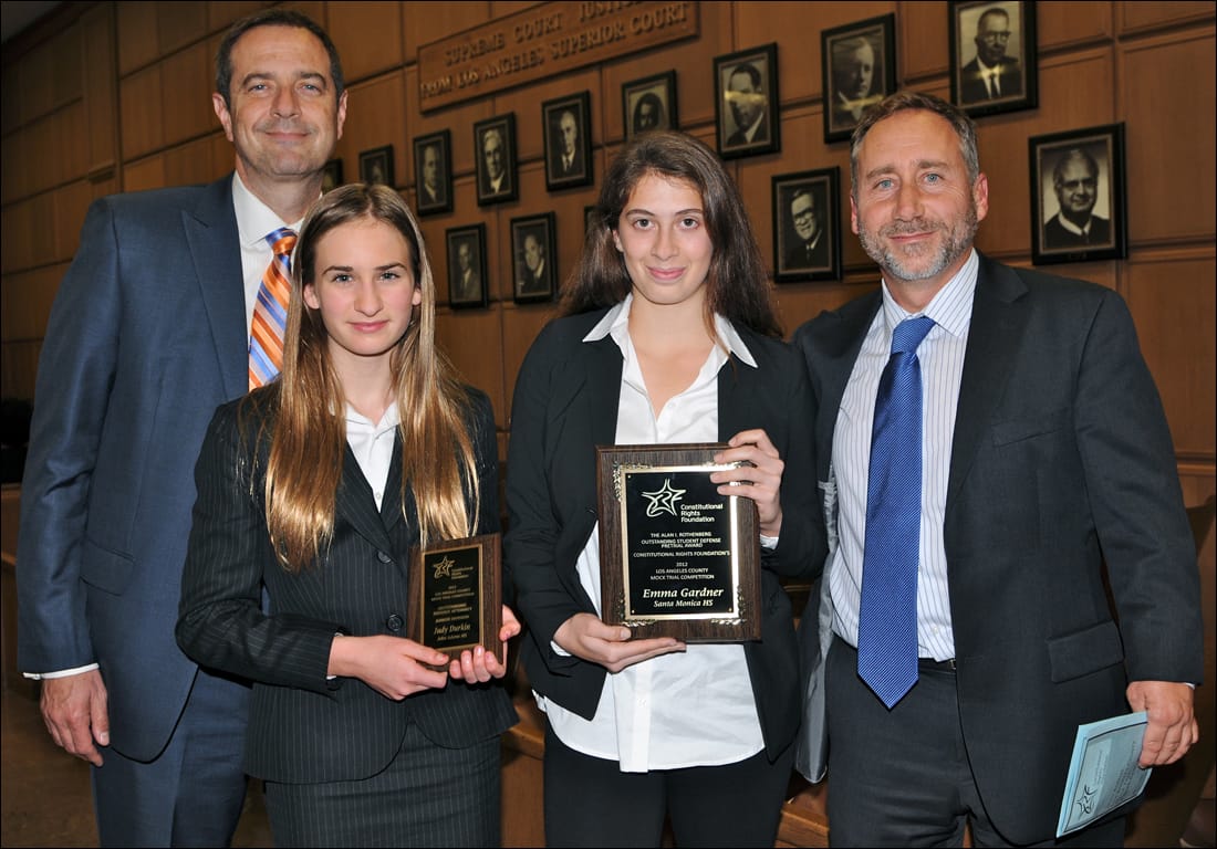 (Left to right) Santa Monica High School mock trial team coach Christopher A. Kanjo, Judy Durkin (seventh grader at John Adams Middle School; awarded ‘Outstanding Defense Attorney' in 2012 Los Angeles County Mock Trial middle school competition); Emma Gardner (junior at Santa Monica High School; awarded ‘Outstanding Defense Pretrial Attorney' in the high school competition); William Sadler (Los Angeles County public defender and coach for both the John Adams Middle School and Santa Monica High School). (Photo courtesy Erin Flannery)
