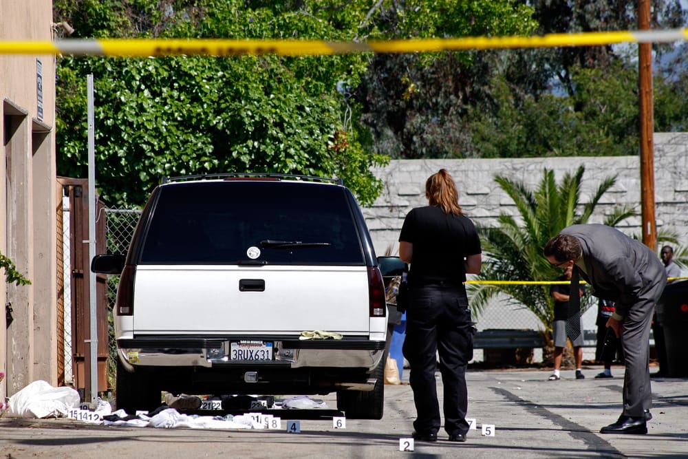 Santa Monica police investigate a shooting in an alley near the intersection of 16th Street and Michigan Avenue  on Tuesday. (Photo by Michael Yanow)