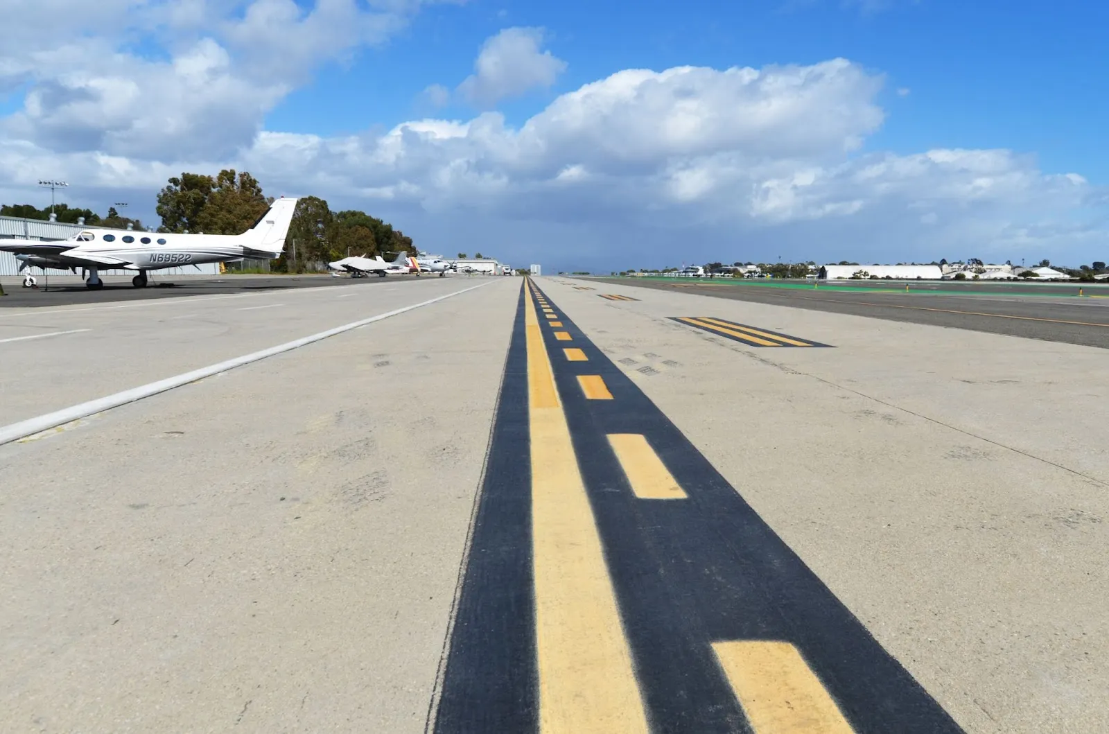 Looking north-east down along the boundary line of Santa Monica Airport's primary runway