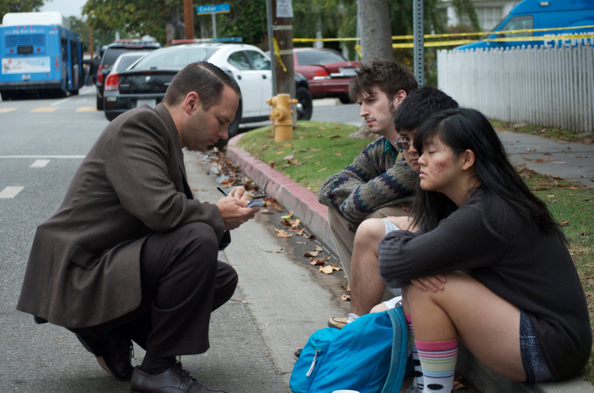 Students at Santa Monica College are interviewed by a detective after the shooting.