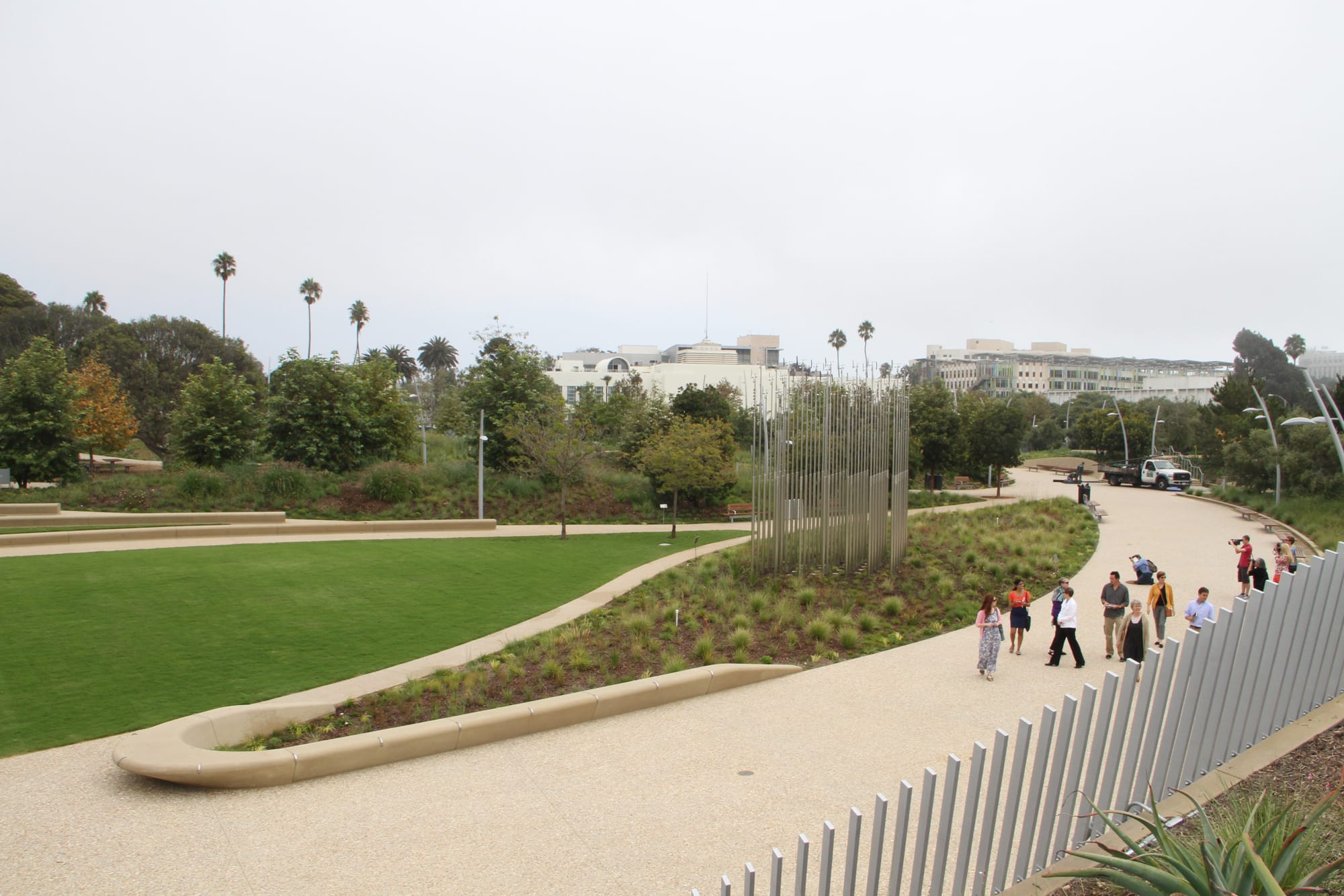 Members of the media take a tour of the 6.2-acre Tongva Park Monday.
